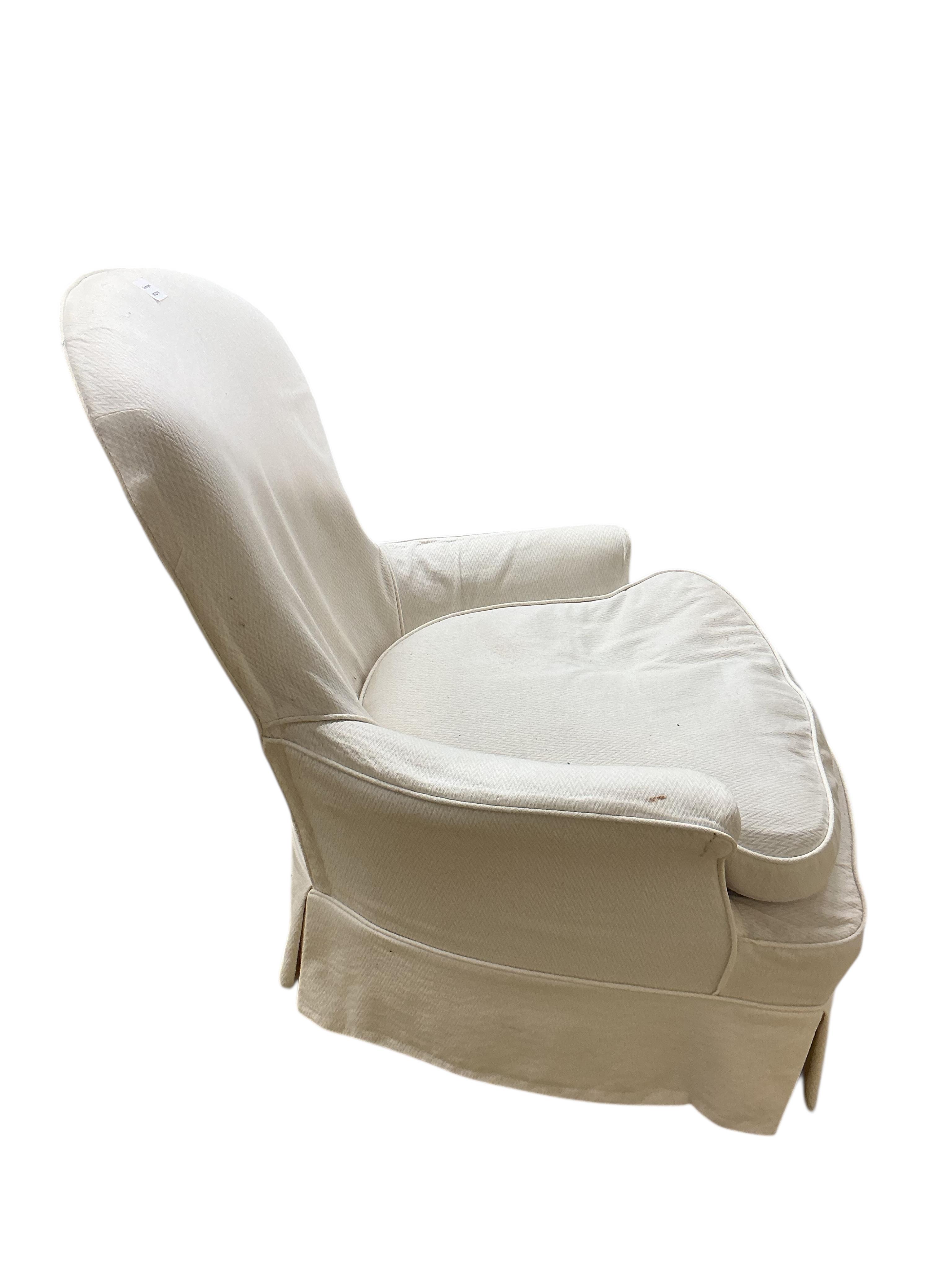 A 19th century French upholstered spoon back armchair, width 75cm, depth 72cm, height 86cm